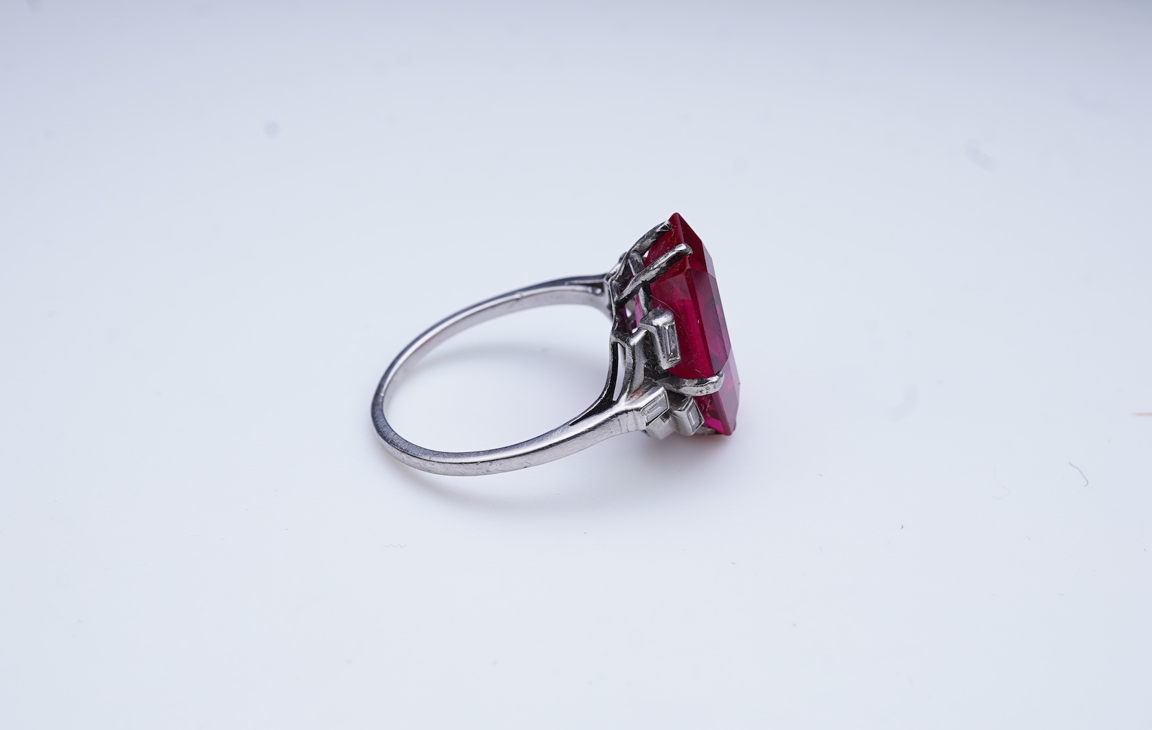 A synthetic ruby and diamond ring